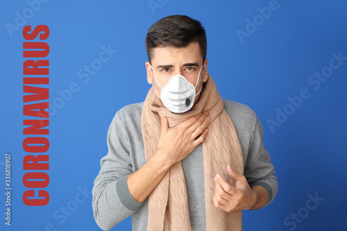 Coughing young man wearing ...