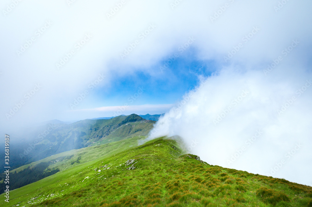 Exploring the mountains of Romania, epic landscapes and low clouds ahead Exploring the mountains of Romania, epic landscapes and low clouds ahead