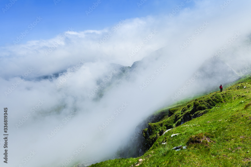 Exploring the mountains of Romania, epic landscapes and low clouds ahead