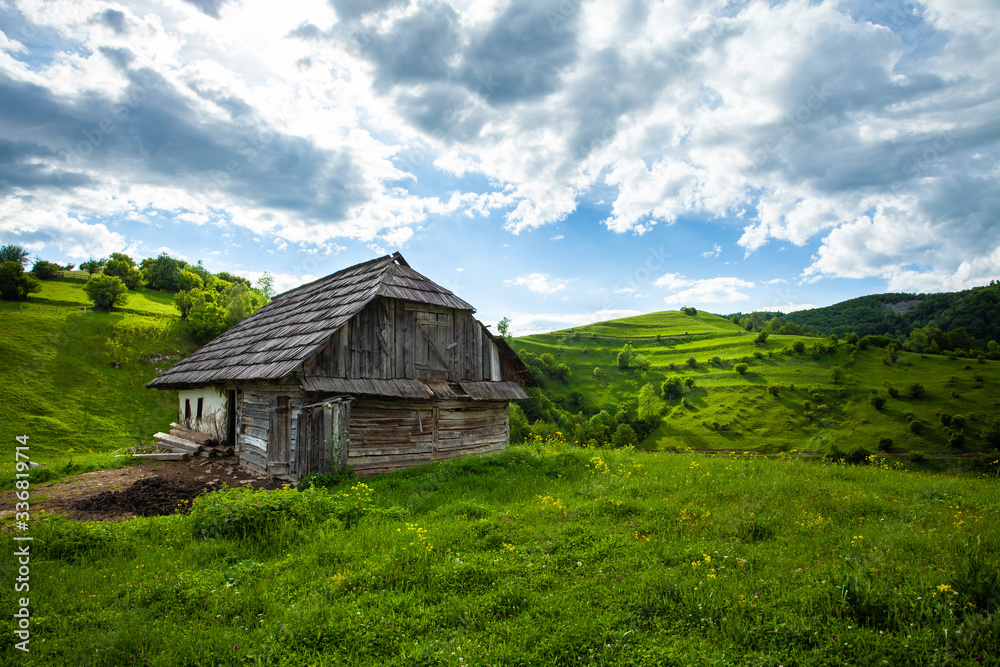 Peaceful life in Romania, small village landscape, old barn house