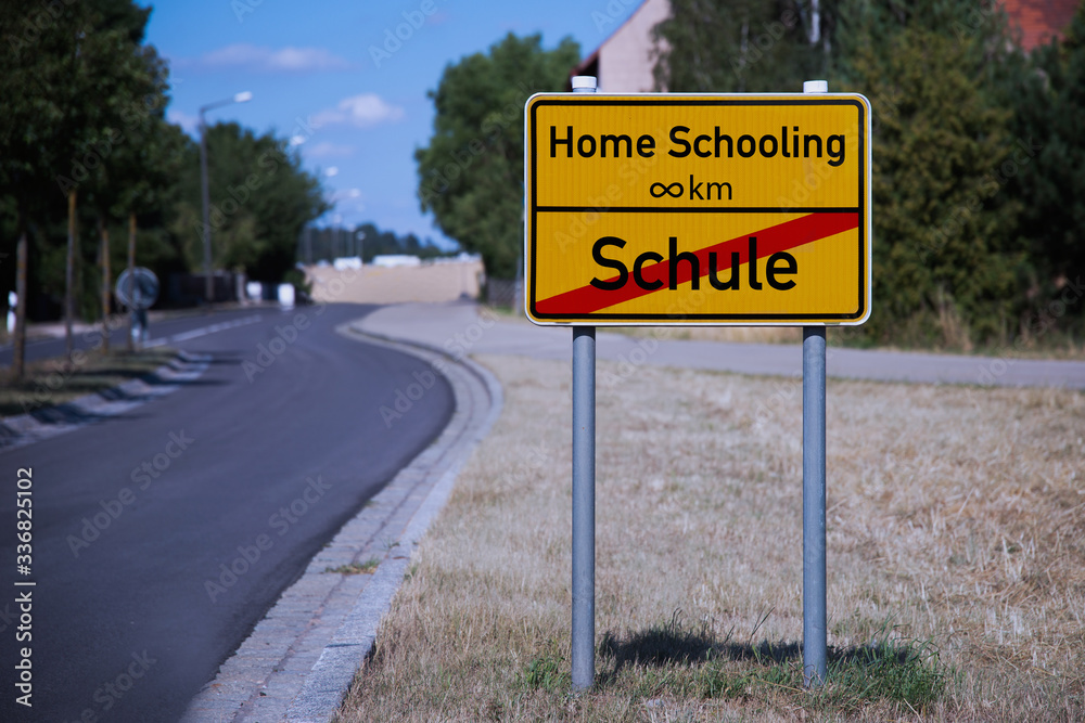 Covid 19 Homeschooling yellow street sign