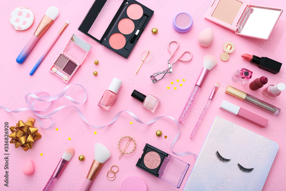 Set of professional decorative cosmetics, makeup tools and accessory on pink background. Beauty, fashion and shopping concept. Flat lay composition, top view Set of professional decorative cosmetics, makeup tools and accessory on pink background. Beauty, fashion and shopping concept. Flat lay composition, top view
