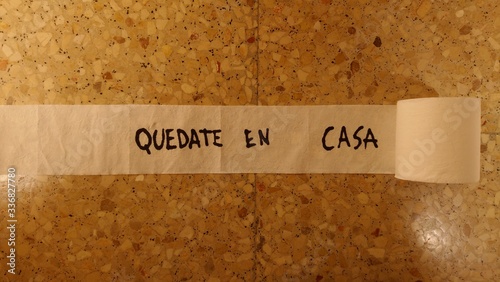 Sing on toilet paper saying , quedate en casa , which in Spanish means stay at home photo