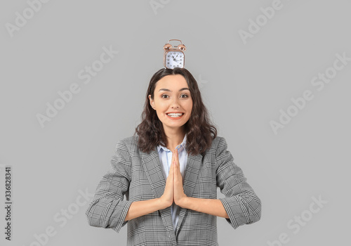 Businesswoman with hourglas...