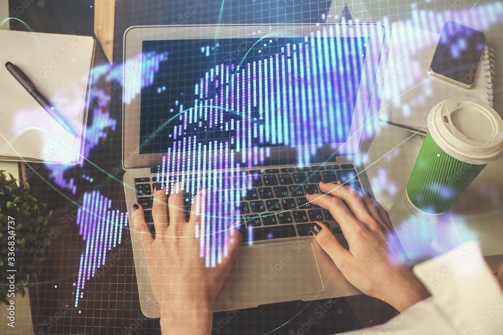 Double exposure of woman hands typing on computer and business theme hologram drawing. Success concept. Double exposure of woman hands typing on computer and business theme hologram drawing. Success concept.