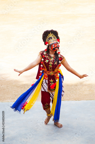 Native Indonesian Dancer Dons Topeng Mask in Cultural Performance