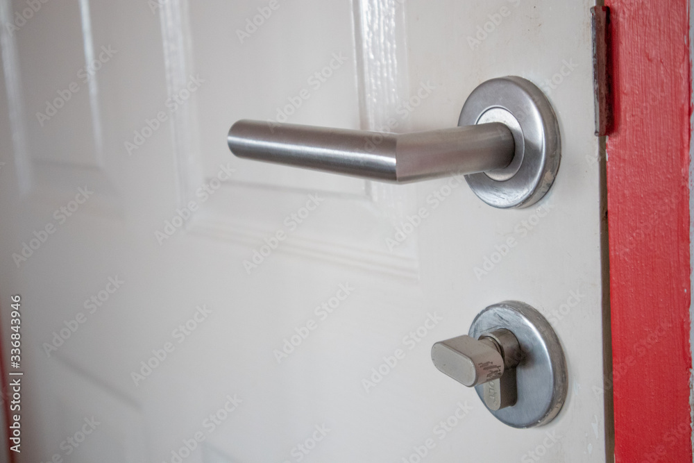 Door handle on white door