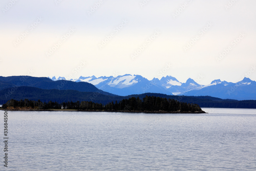 Alaska / USA - August 15, 2019: Alaska coastline view from a cruise ship deck, Alaska, USA