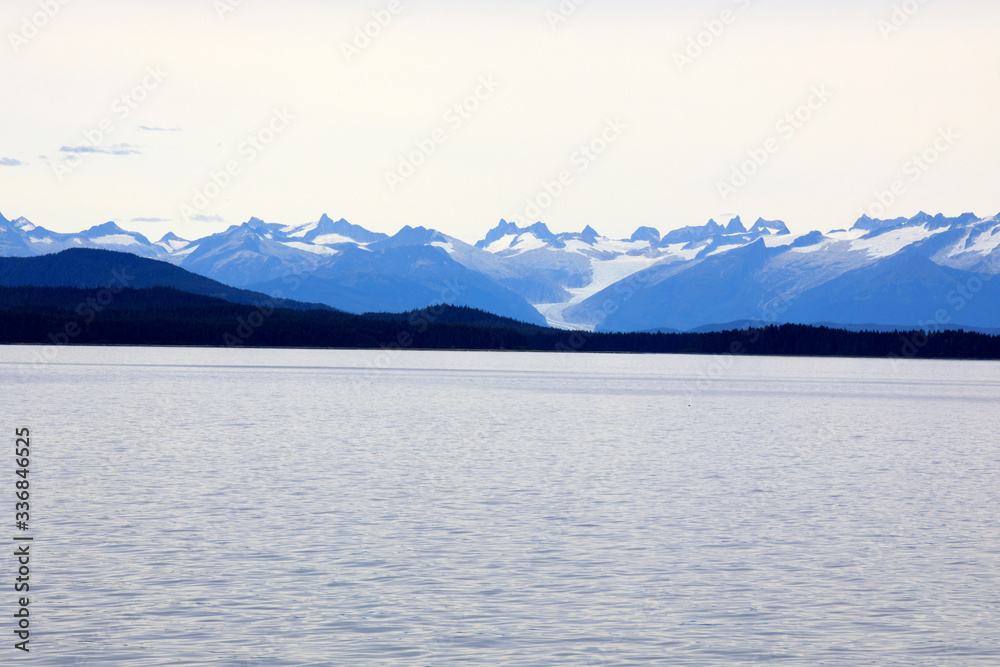 Alaska / USA - August 15, 2019: Alaska coastline view from a cruise ship deck, Alaska, USA