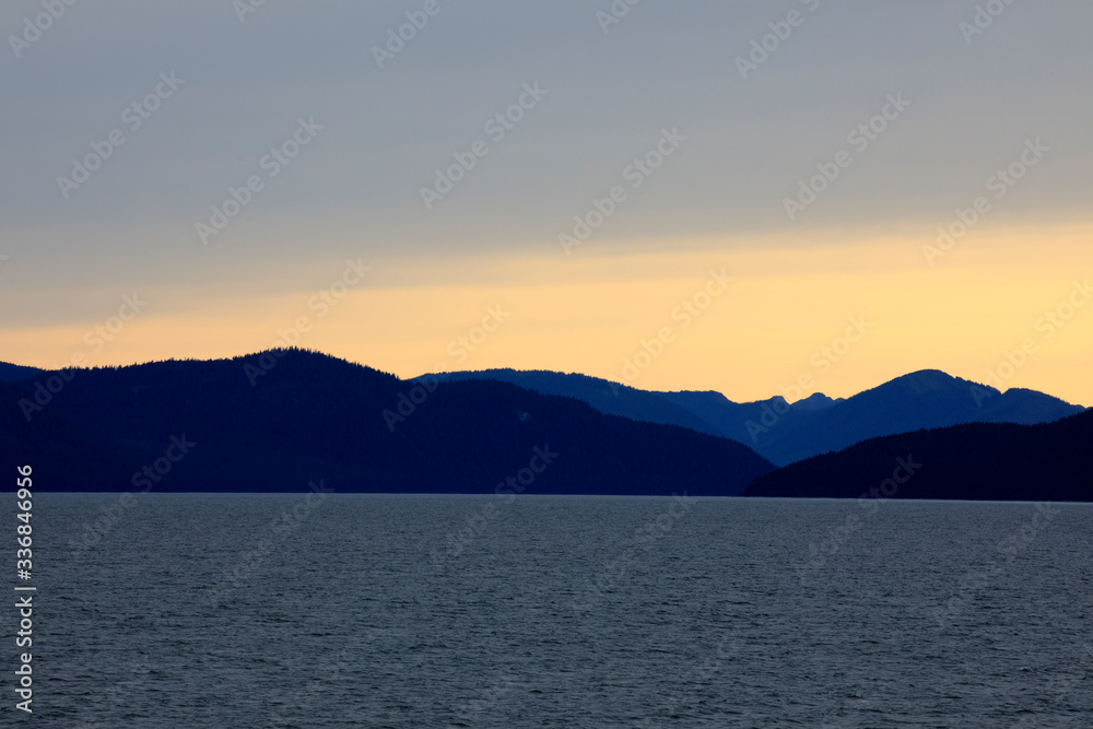 Alaska / USA - August 15, 2019: Alaska coastline view from a cruise ship deck, Alaska, USA