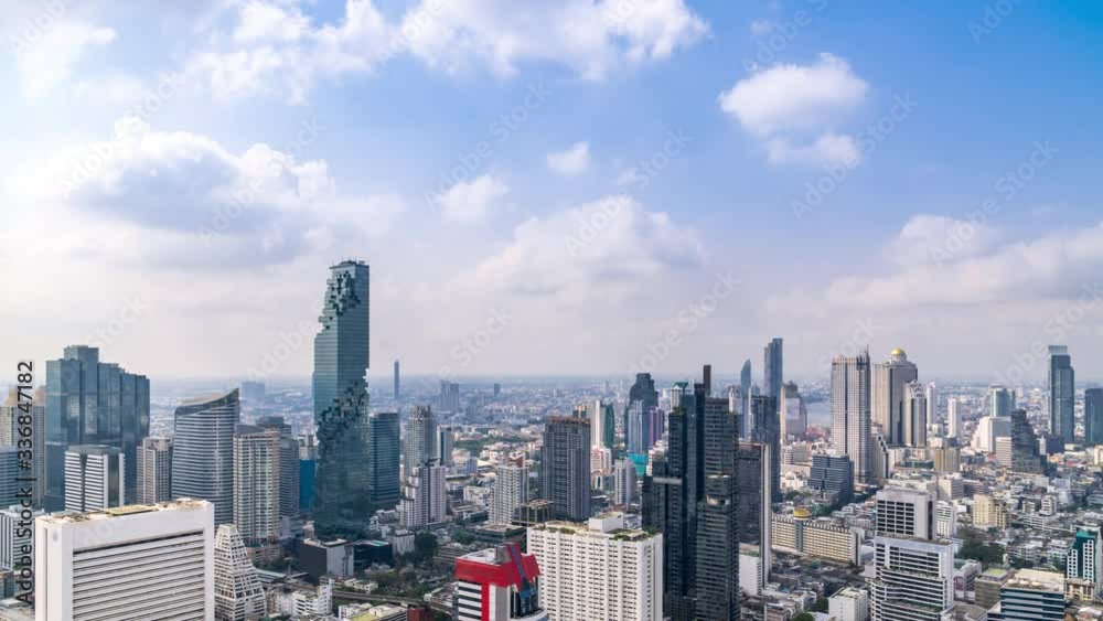 Bangkok business district city center above Silom area, with cloud pass over buildings and skyscrapers; zoom out – Time Lapse Bangkok business district city center above Silom area, with cloud pass over buildings and skyscrapers; zoom out – Time Lapse