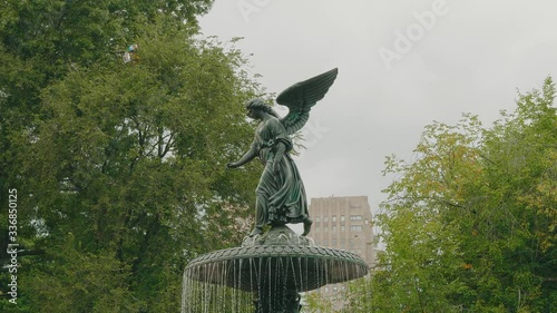 NEW YORK, USA - OCTOBER 2, 2018: View to the Bethesda Fountain with its Angel of the Waters statue in the Central Park. Sculpture was designed by Emma Stebbins in 1868. photo