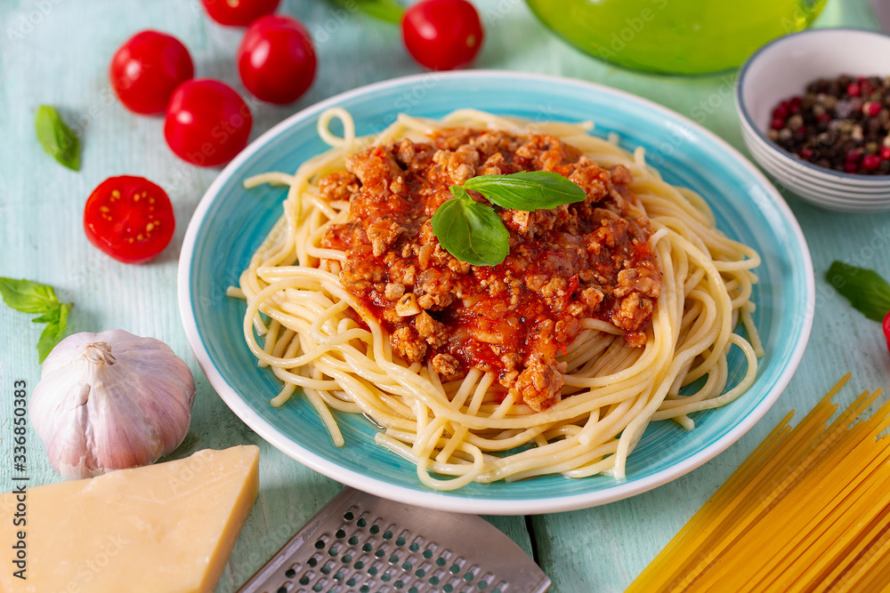 Fotografie spaghetti bolognese on wooden surface