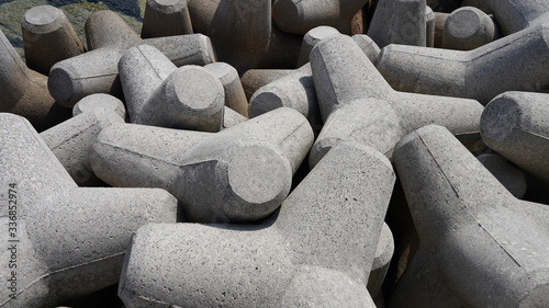 breakwater consisting of gray concrete tetrapods, breakwater texture background photo