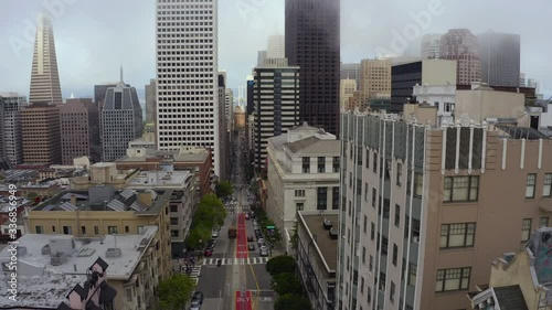 Moody 4k Aerial Video of Foggy San Francisco Skyline + City Streets with Trolley