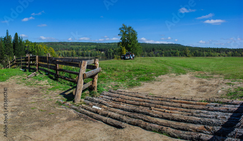 
Irkutsk region, Siberia, arable land, sowing fields, wooden fence