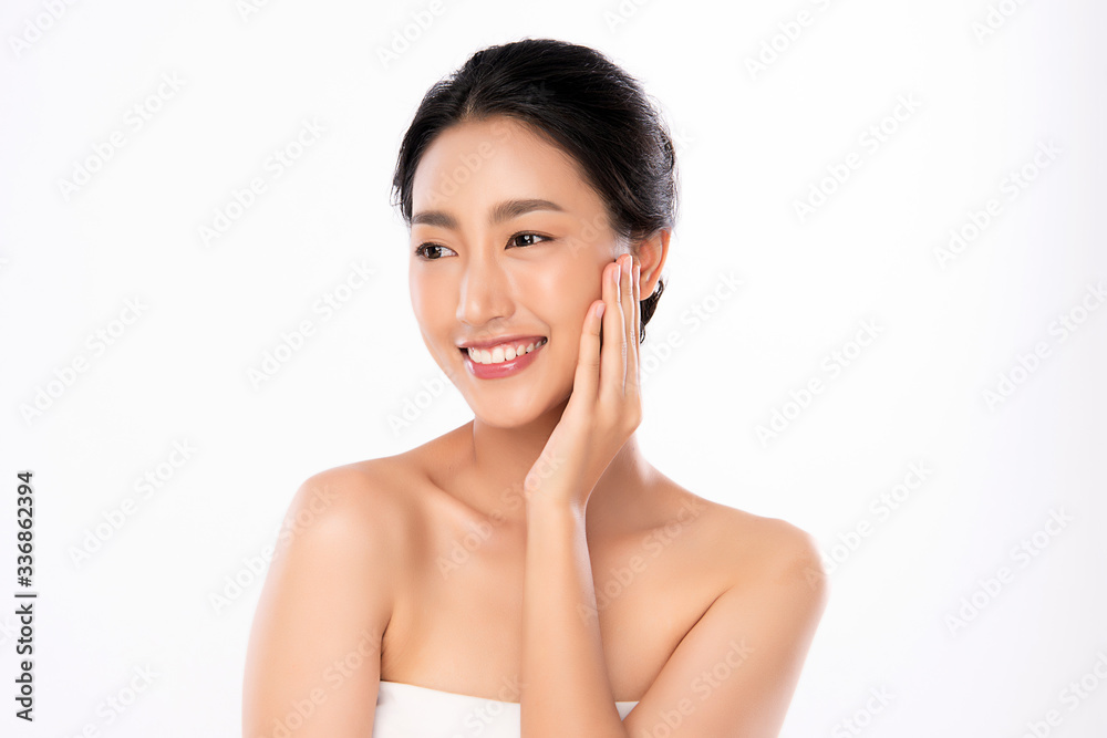 Beautiful Young Asian Woman with Clean Fresh Skin. Face care, Facial treatment, Cosmetology, beauty and healthy skin and cosmetic concept, woman beauty skin isolated on white background Beautiful Young Asian Woman with Clean Fresh Skin. Face care, Facial treatment, Cosmetology, beauty and healthy skin and cosmetic concept, woman beauty skin isolated on white background