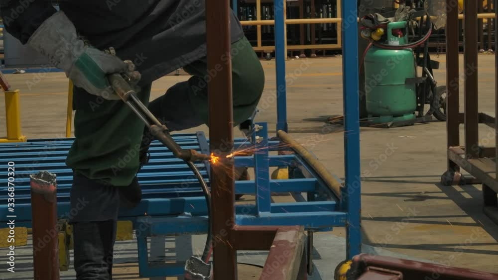Steel fram cutting by a torch, Oxygen acetyline cutting torch Steel fram cutting by a torch, Oxygen acetyline cutting torch