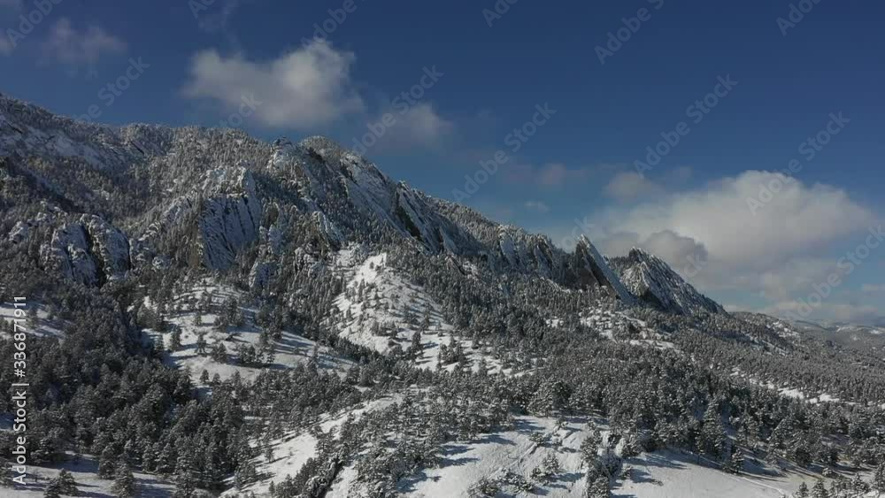 Flying towards snow covered Boulder Colorado Flatirons Flying towards snow covered Boulder Colorado Flatirons