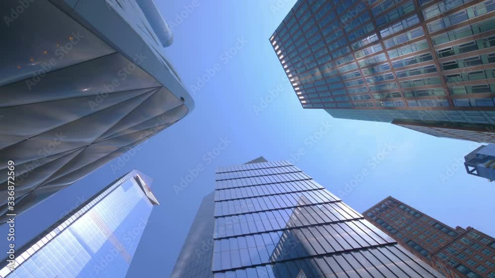Looking Up at Skyscraper Buildings In New York City in 4K Slow motion 60fps Looking Up at Skyscraper Buildings In New York City in 4K Slow motion 60fps