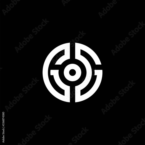 GG monogram logo with abstract circle style and dot in the middle