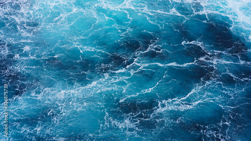 Abstraction of sea foam in the ocean. Dark water  storm waves