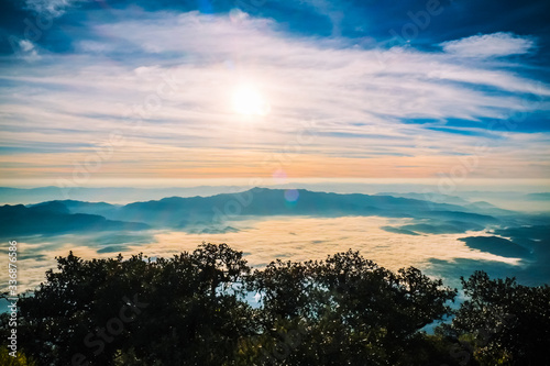 morning clear sky and sun on the top of the mountain