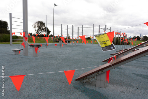 Outdoor Gym temporary closure due to Covid-19 warning sign and flags. 