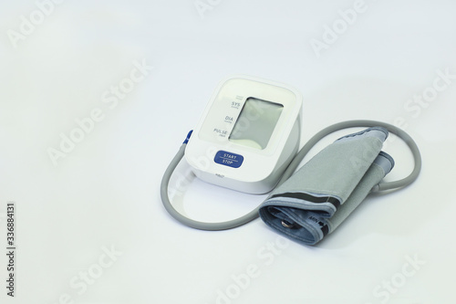 Blood pressure monitor device on a white background