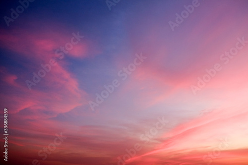 sunset sky shading background from orange to blue © Pop