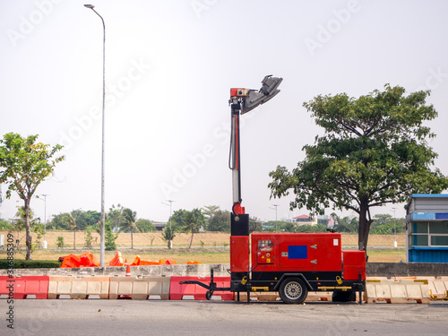 The diesel electric generator and light outdoor on road
