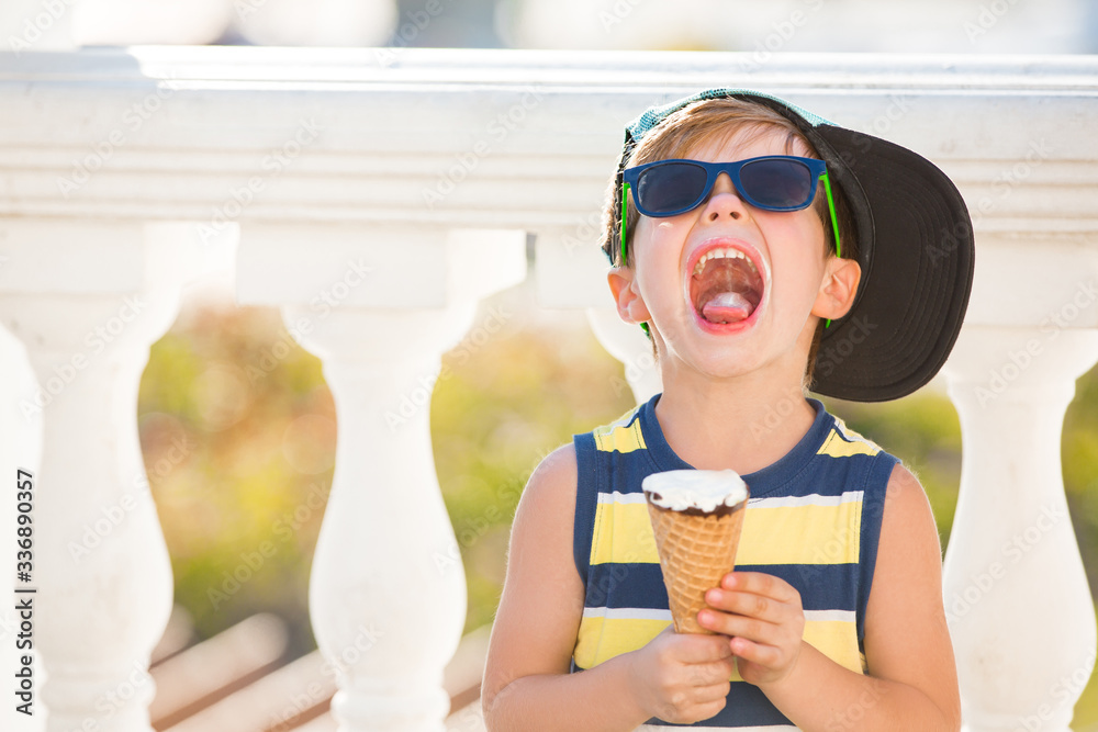 Kid eating ice cream outdoors