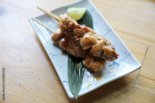 japanese food , Chicken yakitori on wood background