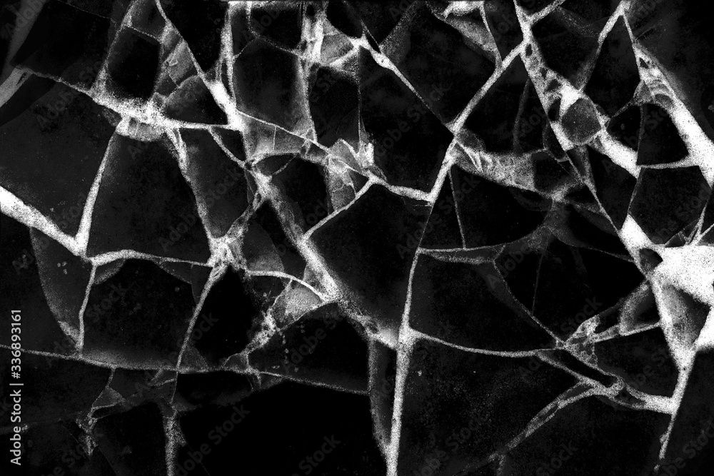 broken glass on a dark background, close-up