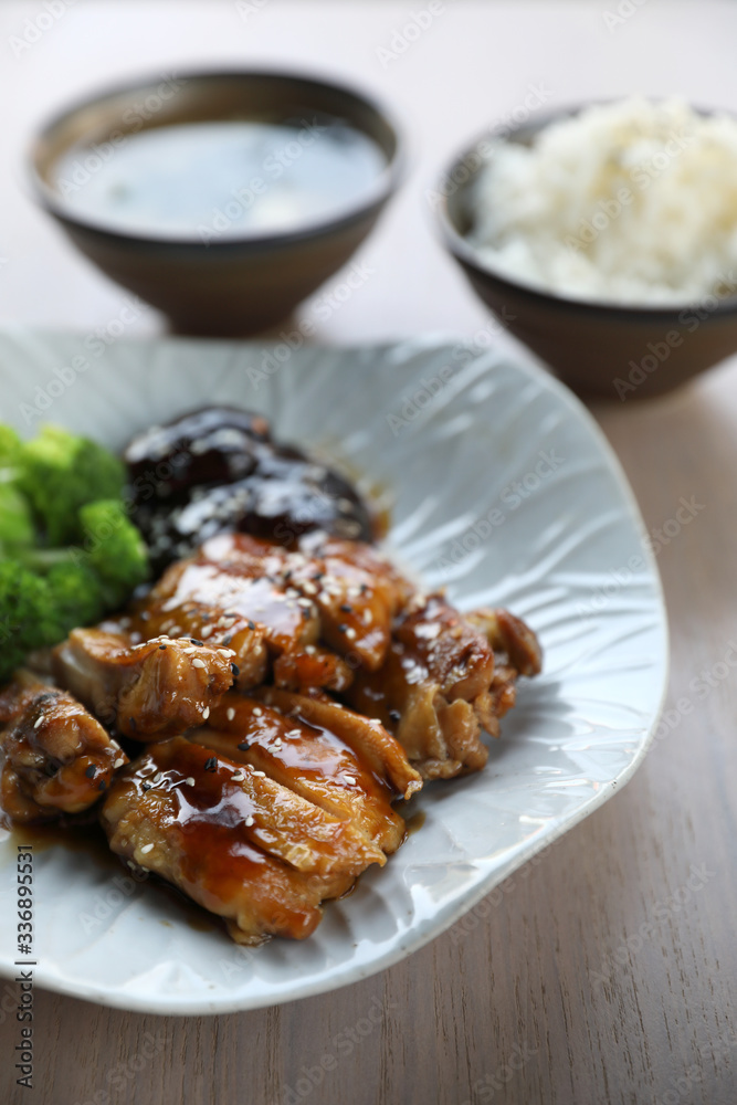 japanese food , Chicken teriyoki with rice on wood background