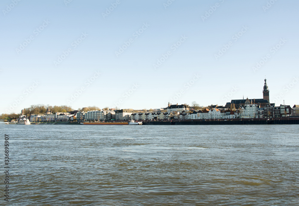 Cityscape of the city of Nijmegen with the Stevenskerk church at the river Waal, Netherlands