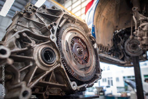 View of engine parts, engine parts and flywheel or flywheel cars Hand auto mechanic work Car repair service