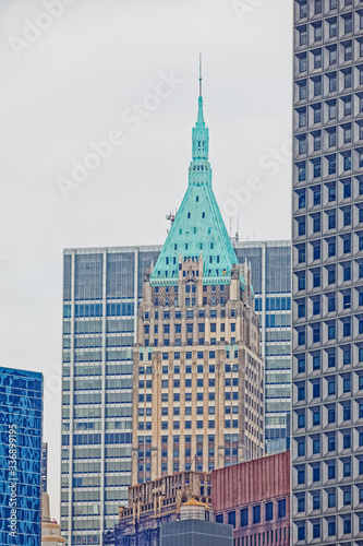 40 Wall Street - The Trump Building during the gloomy weather from the Staten Island Ferry in New York. © Dario Bajurin