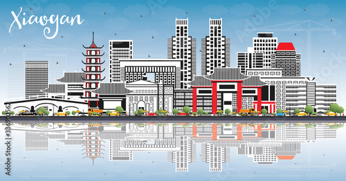 Xiaogan China City Skyline with Color Buildings, Blue Sky and Reflections.