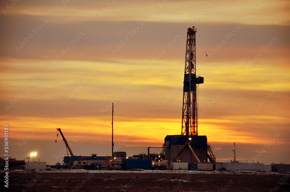 The drilling rig during sunset