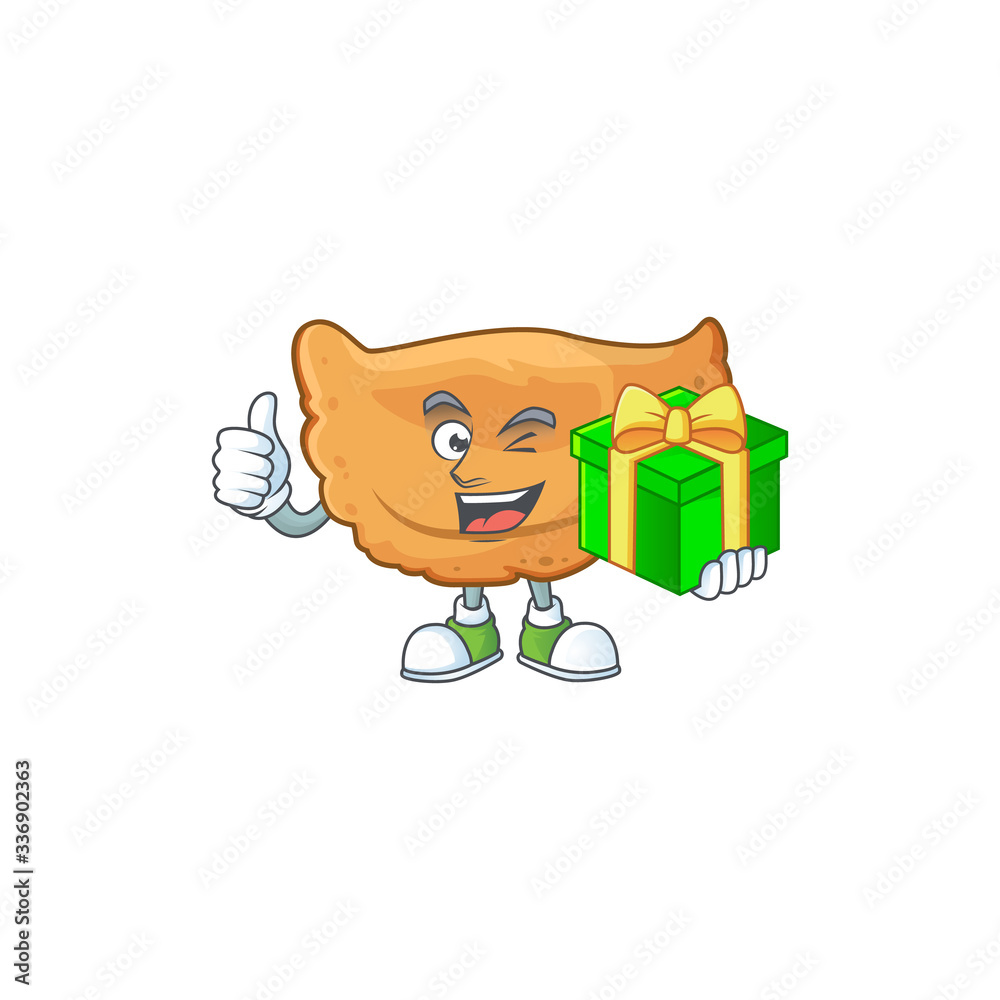 Smiley cornes de gazelle cartoon character holding a gift box Smiley cornes de gazelle cartoon character holding a gift box