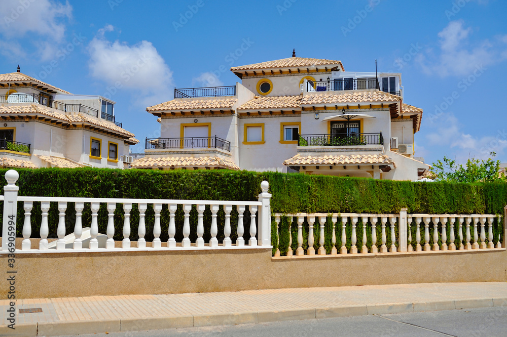 Canarian style houses in the resort town of Orihuela, La Zenia, Spain.