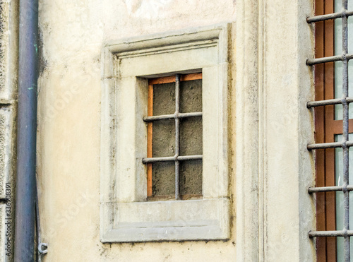 ancient window of historic building © pmmart