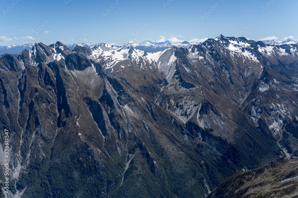 Patriarch peak range dark slopes on High Burn valley, from above, New Zealand Patriarch peak range dark slopes on High Burn valley, from above, New Zealand