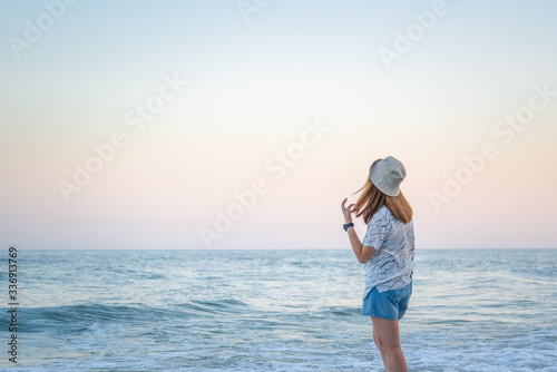 Woman relax at sea beach in concept travel