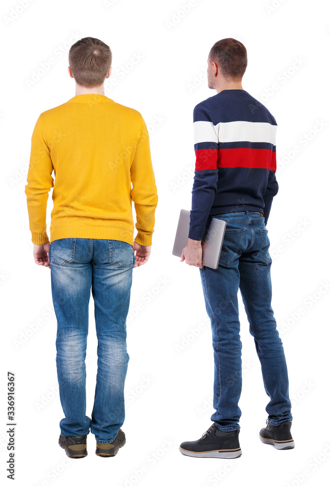 Back view two man in sweater with laptop. Back view two man in sweater with laptop.