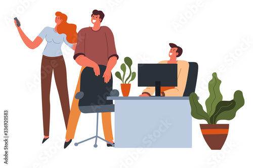 People in office having fun on coffee break taking selfie