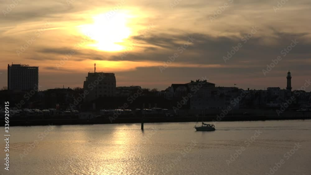 Sunset port of Warnemuende 2 with ships time lapse Sunset port of Warnemuende 2 with ships time lapse