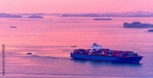Container Ship at the ocean at morning time