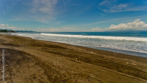 Aerial view of black sand beach. A place to surf.